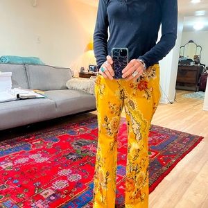 Super fun yellow flare pants with blue, mauve, and designs with subtle sequins.
